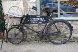 Bike outside Arkwright's DIY Shop Wallpaper