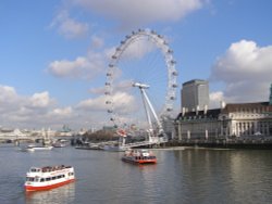 The London Eye with boats.