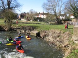 Canoeing opposite the Mill Wallpaper