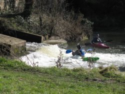 Canoeing opposite the Mill Wallpaper