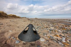 Object on beach Wallpaper