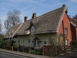 Thatched Houses in the Village Wallpaper