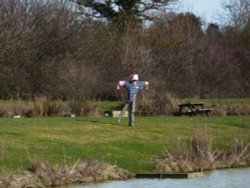 Scarecrow by the lake Wallpaper