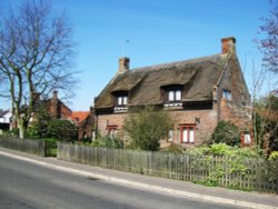 Thatched House in the Village Wallpaper
