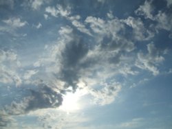 Cloudy skies overhead Wallpaper