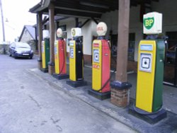 Old style petrol pumps Wallpaper