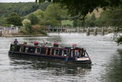 Canal boat on the Thames near Mapledurham Lock