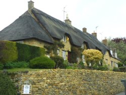 Thatched roof house Wallpaper