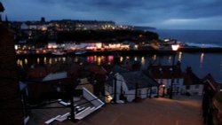 Whitby Harbour by night from steps up tp Abbey Wallpaper