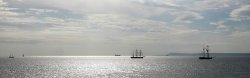 Tall Ships waiting in the bay Wallpaper