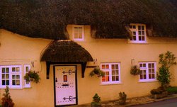Thatched Cottage early evening Wallpaper