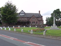 Knowsley Village Hall with War Memorial in foreground Wallpaper