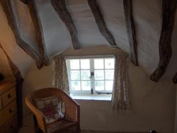 Little Thatch Cottage, bedroom sitting area Wallpaper