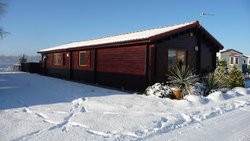 Snow covered Tattershall Wallpaper