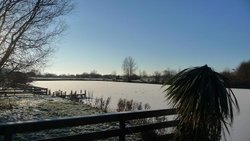 Icey lake in Tattershall Wallpaper