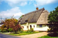 Thatched roof cottage Wallpaper