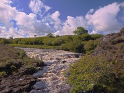 River in Spate Wallpaper