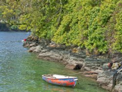 Lone Row Boat Wallpaper