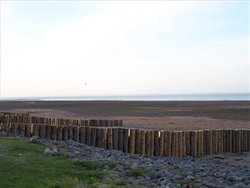 BREAKWATER AT DUNSTER BEACH Wallpaper