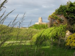 Glimpse of Bamburgh Castle Wallpaper