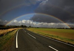 Rainbow and clouds Wallpaper