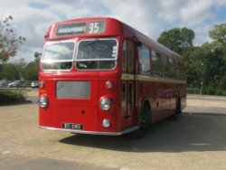 Gleaming Red Bus Wallpaper
