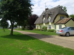 Cottage overlooking the Green Wallpaper
