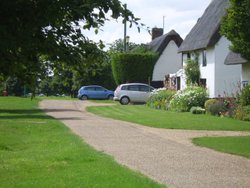 Cottage overlooking the Green Wallpaper