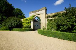Archway to the stable block at Boveridge Park, Cranborne Wallpaper