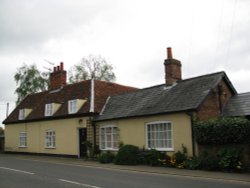 Cottages in the village of Tunstall Wallpaper