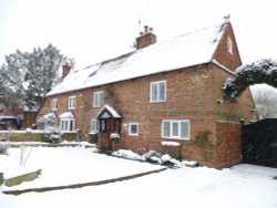 The Cottage in the Snow Wallpaper
