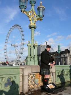 Street Musician playing Bagpipes