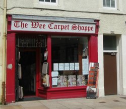 The Wee Carpet Shop Wallpaper