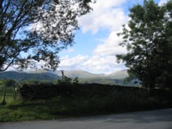 View (2) of Ambleside Hills from the Drunken Duck Inn Wallpaper