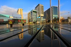 Media City, Salford Quays, a reflection on a picnic bench. Wallpaper