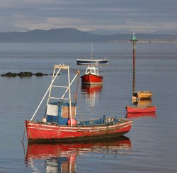 Small boats at high tide, Morecambe, Lancashire Wallpaper