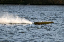 Model Boat on Herrington Park boating lake. Wallpaper