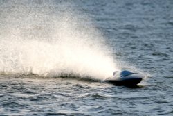 Model Boat on Herrington Park boating lake. Wallpaper