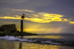 SUNRISE AT HENGISTBURY HEAD