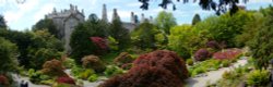 Sizergh Castle gardens with castle beyond Wallpaper