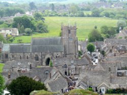 The church, and village of Corfe Castle, in Dorset
