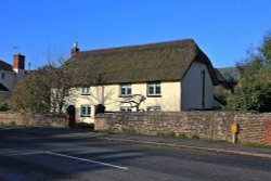 A thatched cottage in Knowle Wallpaper