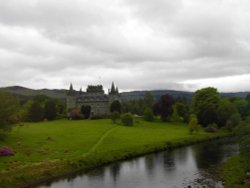 Inveraray Castle, taken from inside the coach going along the road. Wallpaper