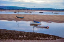 Boats moored on the Dyfi Estuary Wallpaper