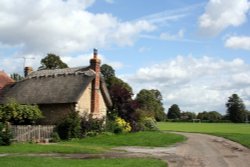 A period thatched cottage on The Green in Warborough Wallpaper
