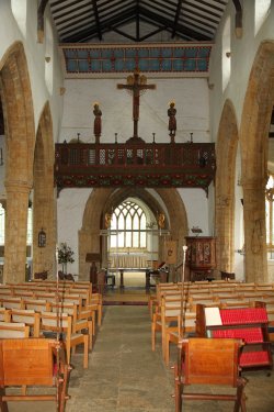 The decorated rood, rood screen and loft in the Church of St. Etheldreda in Horley