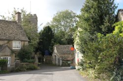 The entrance to St. James' churchyard, Stonesfield Wallpaper