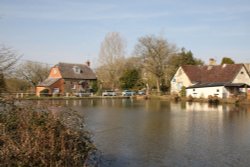 The mill pond in Bishopstone Wallpaper