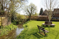 Winterbourne Stream and the small village green at Winterbourne Wallpaper
