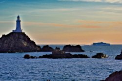 Condor High Speed Ferry Passing the Corbière Lighthouse Wallpaper